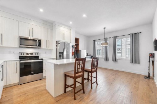 310-669 Savanna Boulevard Ne, Calgary, AB - Indoor Photo Showing Kitchen With Upgraded Kitchen