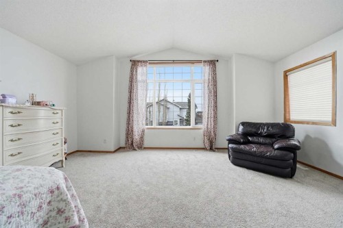 62 New Brighton Circle Se, Calgary, AB - Indoor Photo Showing Bedroom