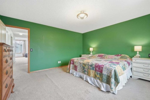 62 New Brighton Circle Se, Calgary, AB - Indoor Photo Showing Bedroom