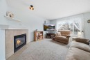 62 New Brighton Circle Se, Calgary, AB  - Indoor Photo Showing Living Room With Fireplace 