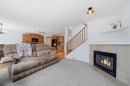 62 New Brighton Circle Se, Calgary, AB  - Indoor Photo Showing Living Room With Fireplace 