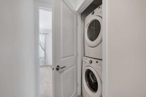 958 Sherwood Boulevard Nw, Calgary, AB - Indoor Photo Showing Laundry Room