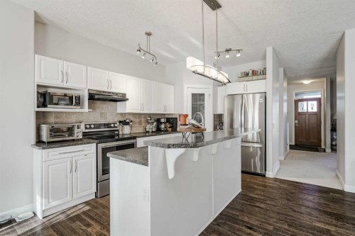 103 Bridle Estates Mews Sw, Calgary, AB - Indoor Photo Showing Kitchen With Stainless Steel Kitchen With Upgraded Kitchen