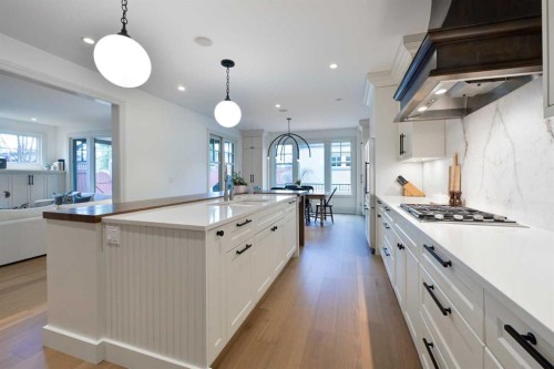 1903 48 Avenue Sw, Calgary, AB - Indoor Photo Showing Kitchen With Double Sink With Upgraded Kitchen