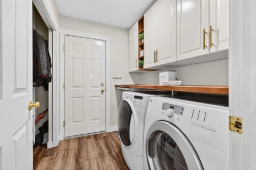 60 Inverness Drive Se, Calgary, AB - Indoor Photo Showing Laundry Room
