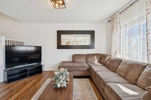 144 Canals Circle Sw, Airdrie, AB - Indoor Photo Showing Living Room