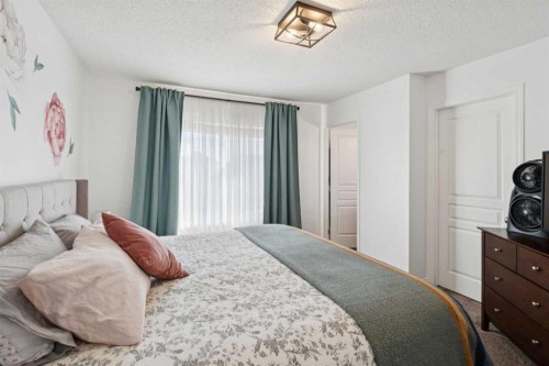 144 Canals Circle Sw, Airdrie, AB - Indoor Photo Showing Bedroom