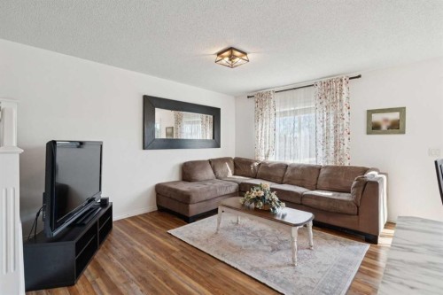 144 Canals Circle Sw, Airdrie, AB - Indoor Photo Showing Living Room