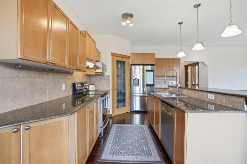 6 Springborough Green Sw, Calgary, AB - Indoor Photo Showing Kitchen With Stainless Steel Kitchen With Double Sink With Upgraded Kitchen