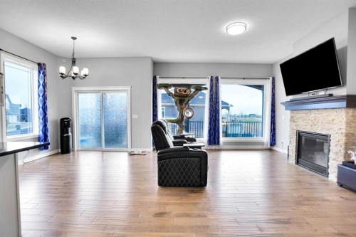 3 Muirfield Close, Lyalta, AB - Indoor Photo Showing Living Room With Fireplace