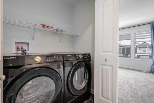 111 Marmot Way Nw, Calgary, AB - Indoor Photo Showing Laundry Room