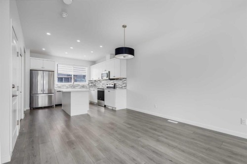 111 Marmot Way Nw, Calgary, AB - Indoor Photo Showing Kitchen With Stainless Steel Kitchen With Upgraded Kitchen