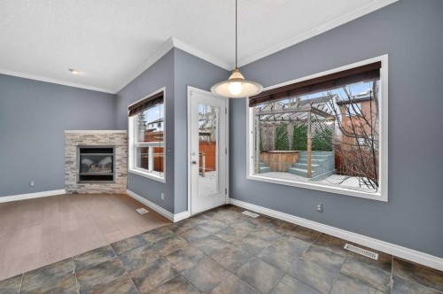 99 Evansbrooke Manor Nw, Calgary, AB - Indoor With Fireplace