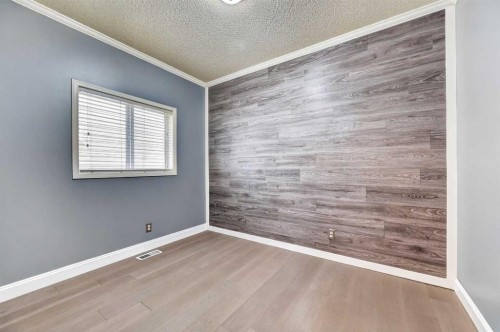 99 Evansbrooke Manor Nw, Calgary, AB - Indoor Photo Showing Other Room