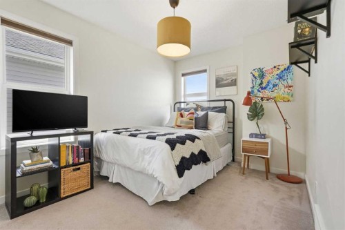 45 Copperpond Avenue Se, Calgary, AB - Indoor Photo Showing Bedroom