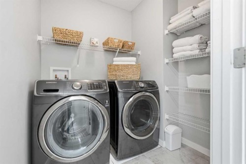 45 Copperpond Avenue Se, Calgary, AB - Indoor Photo Showing Laundry Room