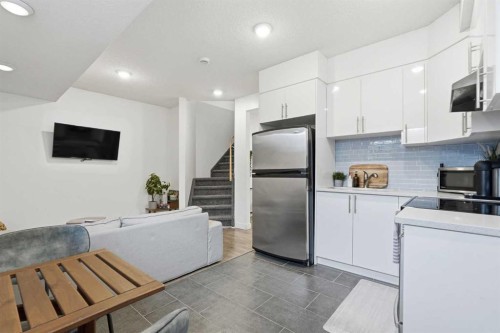 45 Copperpond Avenue Se, Calgary, AB - Indoor Photo Showing Kitchen With Stainless Steel Kitchen