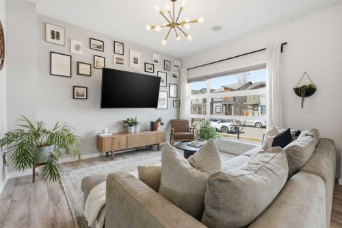 45 Copperpond Avenue Se, Calgary, AB - Indoor Photo Showing Living Room