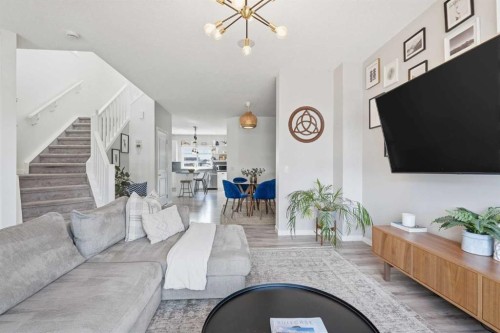 45 Copperpond Avenue Se, Calgary, AB - Indoor Photo Showing Living Room