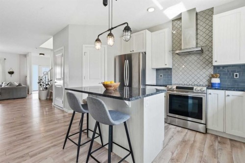 45 Copperpond Avenue Se, Calgary, AB - Indoor Photo Showing Kitchen With Stainless Steel Kitchen With Upgraded Kitchen
