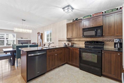 107 Skyview Springs Manor Ne, Calgary, AB - Indoor Photo Showing Kitchen With Double Sink