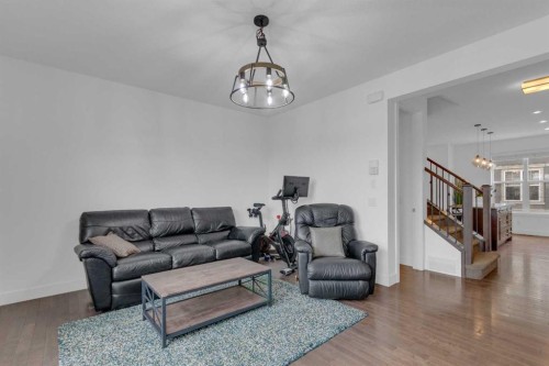 424 Quarry Way Se, Calgary, AB - Indoor Photo Showing Living Room