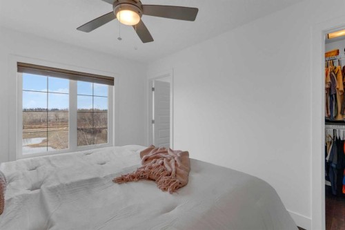424 Quarry Way Se, Calgary, AB - Indoor Photo Showing Bedroom