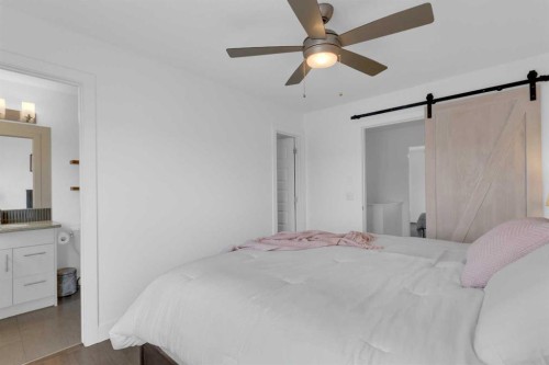 424 Quarry Way Se, Calgary, AB - Indoor Photo Showing Bedroom