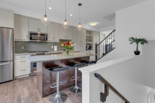 424 Quarry Way Se, Calgary, AB - Indoor Photo Showing Kitchen With Stainless Steel Kitchen With Upgraded Kitchen