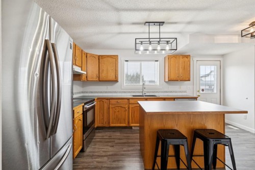 87 Cimarron Meadows Way, Okotoks, AB - Indoor Photo Showing Kitchen