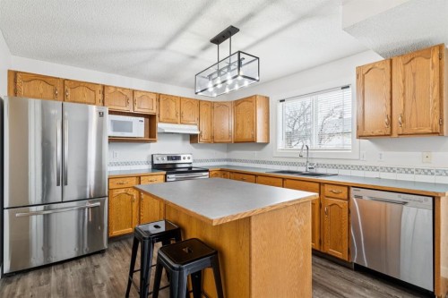 87 Cimarron Meadows Way, Okotoks, AB - Indoor Photo Showing Kitchen