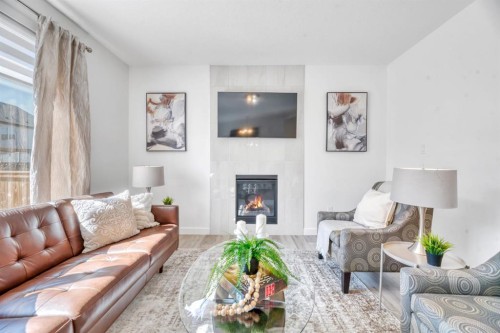 485 Legacy Boulevard Se, Calgary, AB - Indoor Photo Showing Living Room With Fireplace