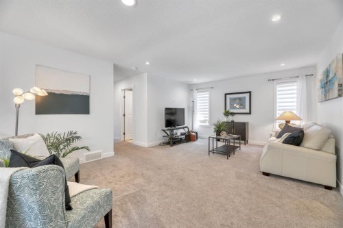 485 Legacy Boulevard Se, Calgary, AB - Indoor Photo Showing Living Room
