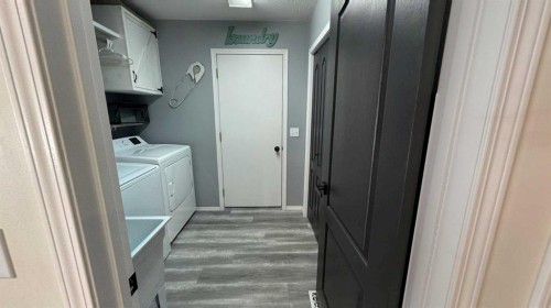24-32375 Range Road 62, Rural Mountain View County, AB - Indoor Photo Showing Laundry Room