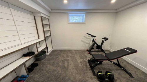 24-32375 Range Road 62, Rural Mountain View County, AB - Indoor Photo Showing Gym Room