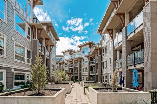 135-721 4 Street Ne, Calgary, AB - Outdoor With Balcony With Facade