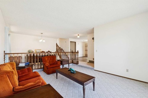 2627 126 Avenue Sw, Calgary, AB - Indoor Photo Showing Living Room