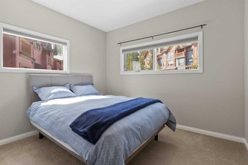 113-80 Dyrgas Gate, Canmore, AB - Indoor Photo Showing Bedroom