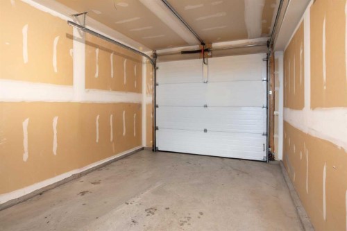113-80 Dyrgas Gate, Canmore, AB - Indoor Photo Showing Garage