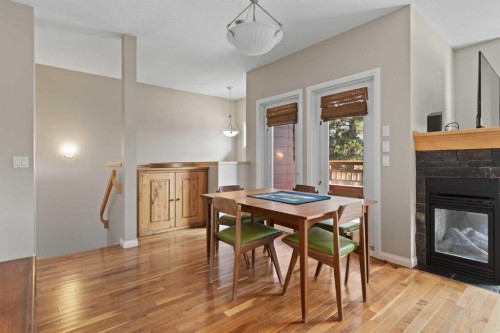 113-80 Dyrgas Gate, Canmore, AB - Indoor With Fireplace