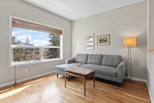 113-80 Dyrgas Gate, Canmore, AB - Indoor Photo Showing Living Room