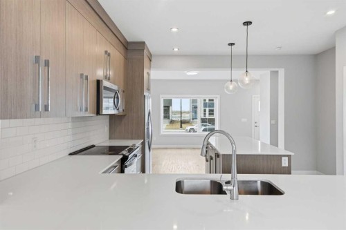 592 Dawson Drive, Chestermere, AB - Indoor Photo Showing Kitchen With Double Sink With Upgraded Kitchen