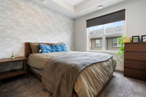 8 Evanscrest Gardens Nw, Calgary, AB - Indoor Photo Showing Bedroom