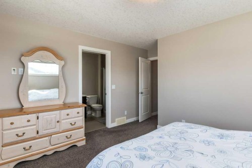705 Nolan Hill Boulevard Nw, Calgary, AB - Indoor Photo Showing Bedroom