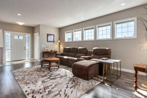 705 Nolan Hill Boulevard Nw, Calgary, AB - Indoor Photo Showing Living Room