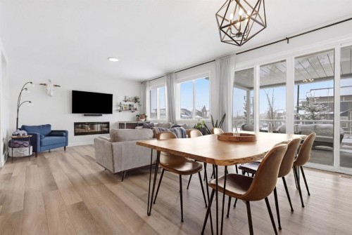 3 Sundown Crescent, Cochrane, AB - Indoor With Fireplace