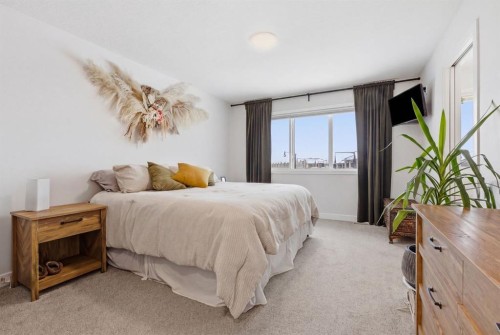 3 Sundown Crescent, Cochrane, AB - Indoor Photo Showing Bedroom