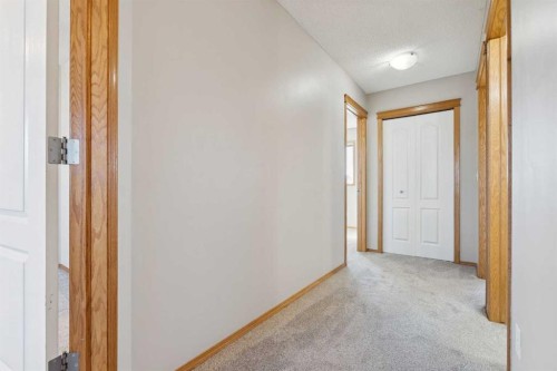 111 Luxstone Crescent Sw, Airdrie, AB - Indoor Photo Showing Other Room