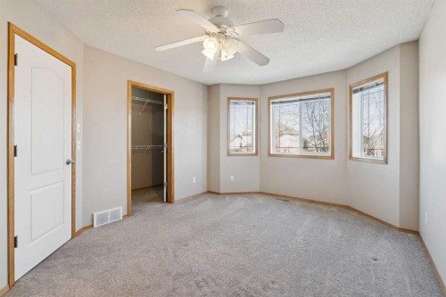 111 Luxstone Crescent Sw, Airdrie, AB - Indoor Photo Showing Other Room