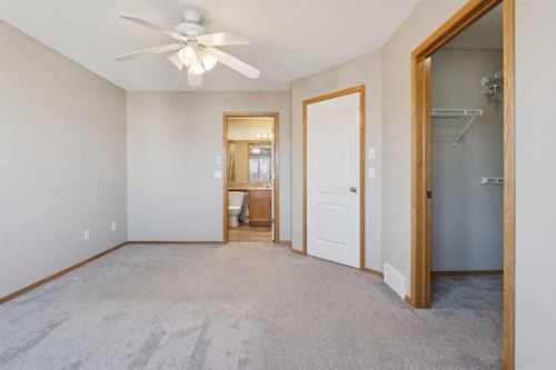 111 Luxstone Crescent Sw, Airdrie, AB - Indoor Photo Showing Other Room
